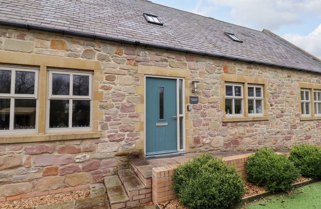 THE OLD STABLES, pet friendly, with open fire in Bamburgh