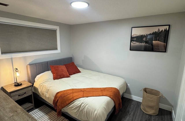 The Paddle On Inn! A canoe-themed basement suite with all the modern finishes!