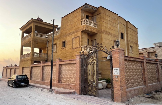 The red villa is the first north coast road, 15 minutes from the airport.