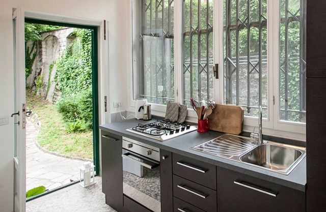 THE SKYLINES OF COMO FROM BRUNATE HILL TOP