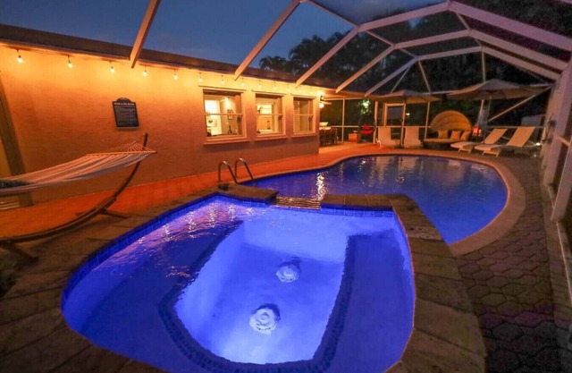 The Utopia Resort Heated Pool Spa Waterfall BBQ Studio and more Hosted by Relaxtay