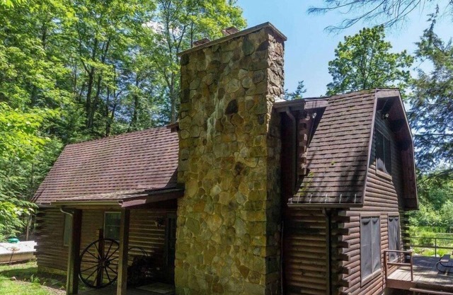 "Timber Acres" is nestled in the woods with private pond in Eagles Mere