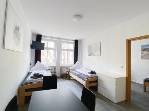 Top-Lage Apartments für 4 Personen, Premium mit Doppelbett oder Standard mit Einzelbetten