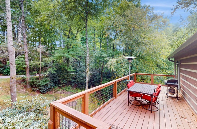 Tree-lined, dog-friendly cabin in ideal location with deck, wood stove & pool