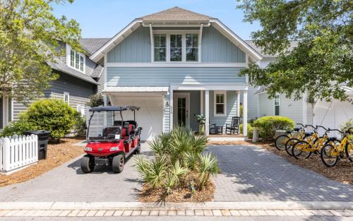 Two Rocking Chairs on a Porch by Oversee 30A