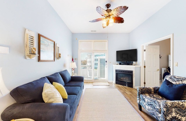 Updated condo with balcony, pool, fireplace & washer/dryer