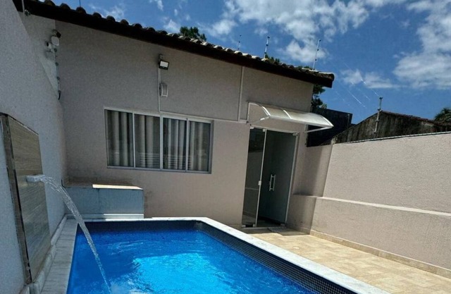 Vacation home in Itanhaém, a few minutes from the beach, with swimming pool and parking
