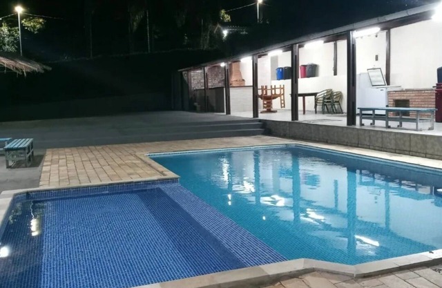 Villa in Santana de Parnaíba with adult and children's pool.