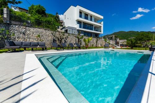 Villa K Opatija with a heated pool, sauna, astonishing sea view