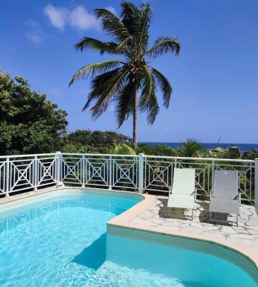 Villa Muscade guadeloupe, piscine, vue mer et accès plage