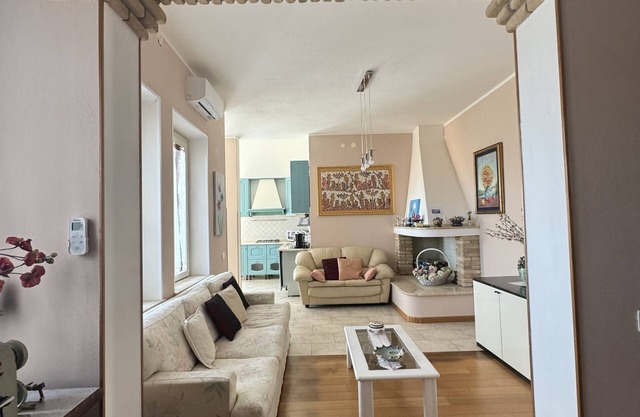 Villa of flowers, nestled in the green between the sea and the mountains.