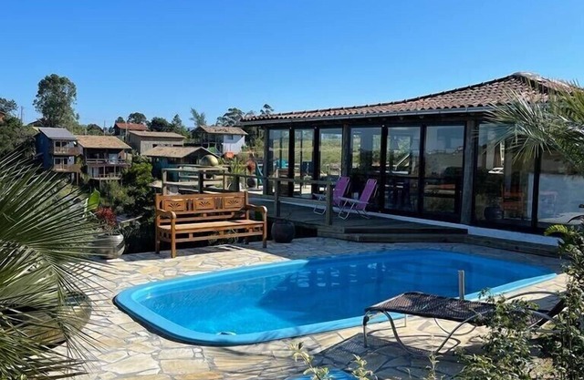 Villa Santorini Praia do Rosa with pool and jacuzzi