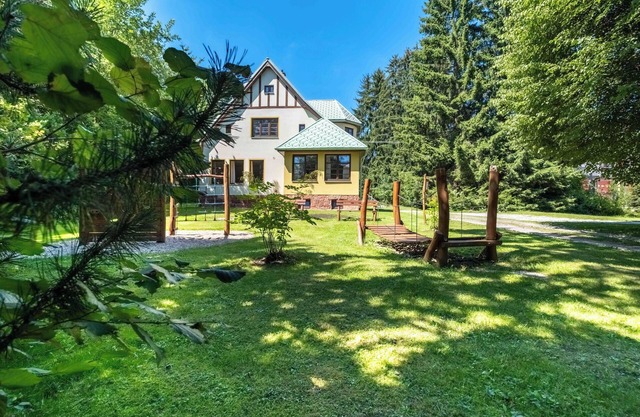 Villa with an covered pool, park, and playground
