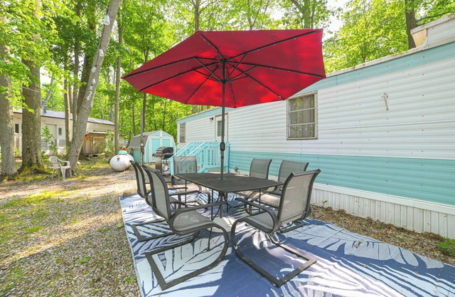 Walk to Manistee Lake: Retro Cottage w/Fire Pit!