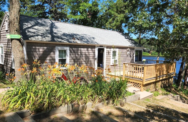 Waterfront Cottage on Private Pond minutes from the Ocean and Bay