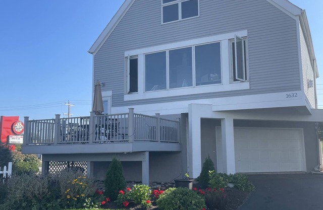 Waterfront home;heated pool & spa: walk to public beach; food, bars, live music!