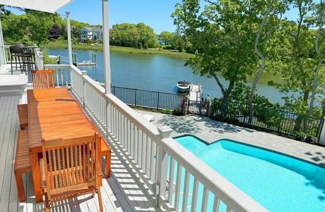 Waterfront home with private boat dock, heated pool, kayaks, A/C, and more