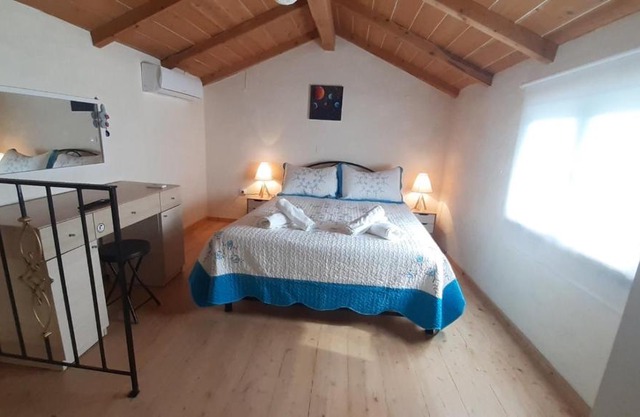 White Manolia Cottage