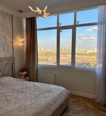 Yesil District Apartment | Вид на Ботанический сад и Астану Арену! Рядом Барыс Арена и Велотрек , мед объекты столицы!