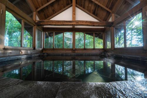 Azumino Villa | 最大16人宿泊可能 昭和の大横綱が愛した 源泉かけ流し半露天温泉 付き一棟貸し切りVilla 洗心庵