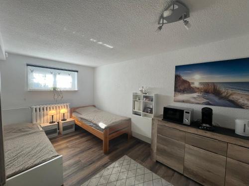 Eichsfelder Kessel Apartment | 1-Raum Ferienwohnung Souterrain Niederorschel