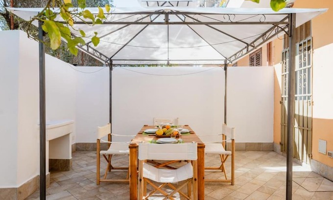 Alghero Apartment | 15min a piedi dal centro appartamento con Patio Privato!