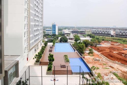 Cikarang Apartment | 1BR Spacious Combine Unit at Vasanta Innopark Apartment By Travelio