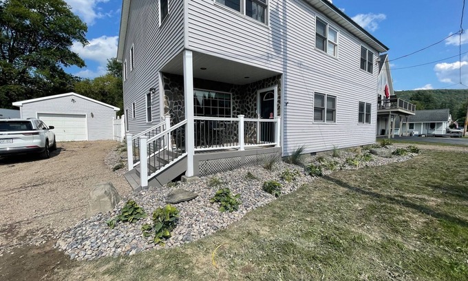 De Ruyter House | 4-bedroom house on DeRuyter Lake with WiFi, Fitness room, AC and Hot Tub!