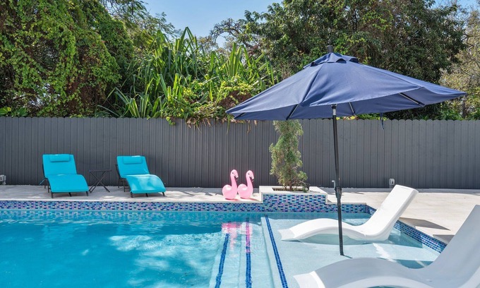 North Miami House | 4BR Oasis w/heated pool & arcade! Pet friendly, groups, couples & families!