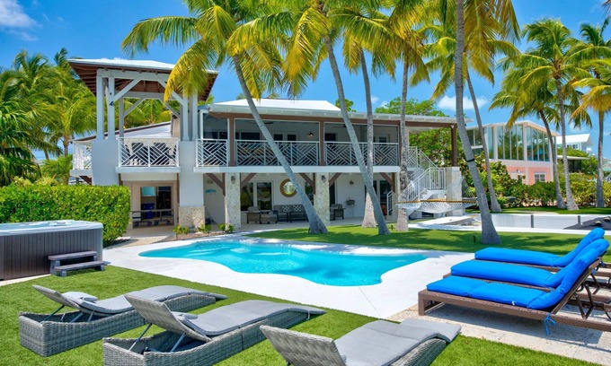 Lime Grove Estates House | 5BR/4.5BA Ocean Views Pool & Hot Tub Dock Kayaks Bikes & More