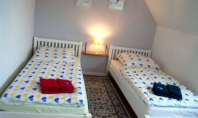 Dannewerk Apartment | 70 sqm for up to 4 people in Dannewerk Schleswig-Holstein. Car parking space and storage room for e-bikes, washing machine, full bathroom with bathtub, high chair and travel cot are available Bedding for the travel cot please bring your own.