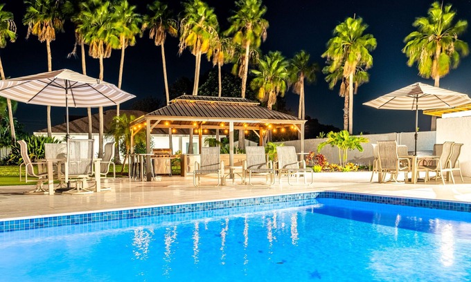 Palma Sola House | 75 Palms! 8 Bedroom Home by RedAwning