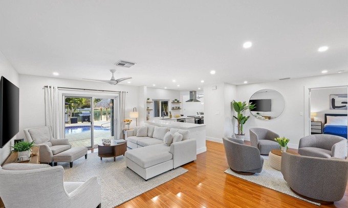 Tropic Palms House | 796 Serene 4BR Villa: Heated Pool, Tiki Hut & Waterfront Views in Delray Beach!