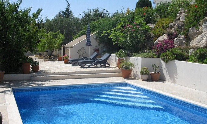 Tsada Villa | A hillside retreat with a large pool and set in extensive gardens