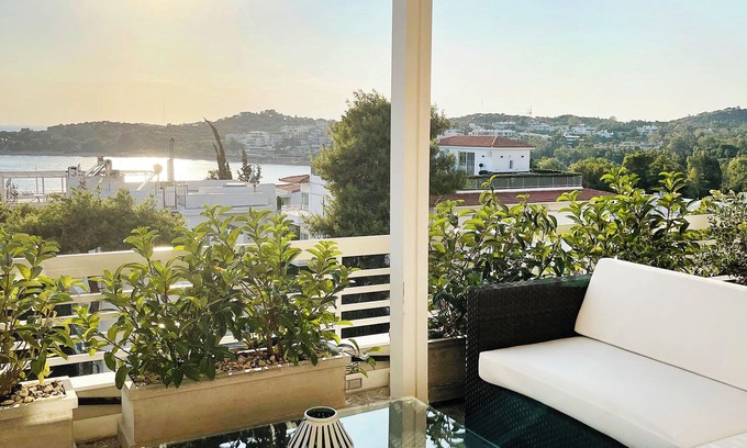 Vouliagmeni Apartment | A unique 3 level penthouse with a great sea view to Vouliagmeni Bay