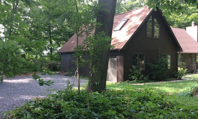 Burt Cabin | A warm relaxing couples retreat with all the comforts of home .