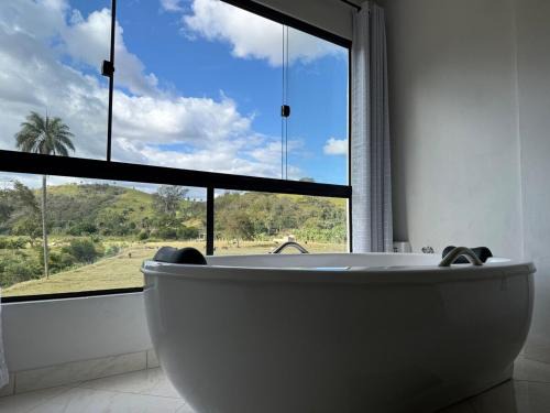 Avelar Apartment | Aconchego Serrano com banheira