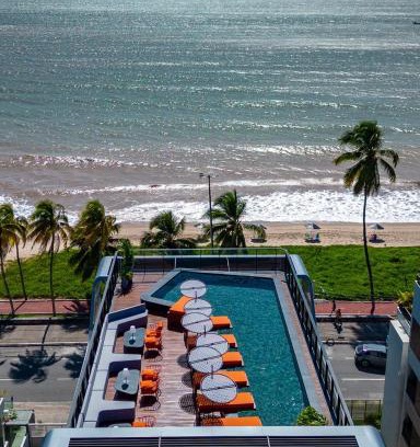 Cabo Branco Apartment | Acorde com o som do mar no Cabo Branco - flat com piscina aquecida e ar condicionado