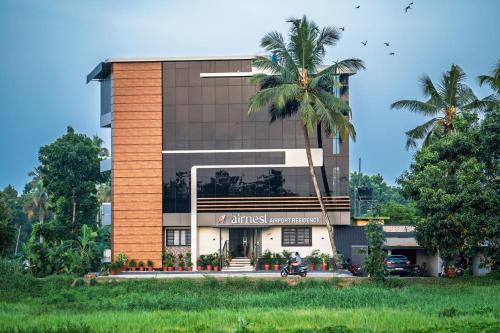 Alwaye Hotel | AIRNEST Airport Residency