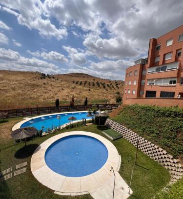 Camas Apartment | Apartamento Jardín de Atalaya
