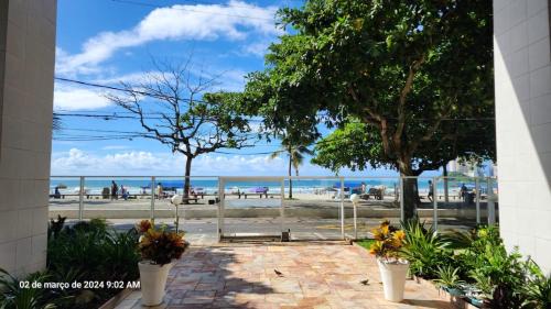 Pitangueiras Apartment | Apartamento pé na areia Guarujá 3 quartos 3 banheiros sala cozinha equipada