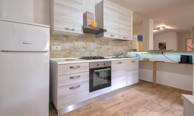 Nulvi Apartment | Apartment 'Aliadehome' with Private Terrace, Balcony and Wi-Fi