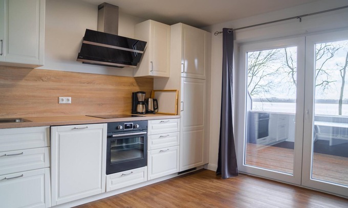 Ekenis Apartment | Apartment 17 in the Schleiblick apartment house with a direct view of the Schleiblick