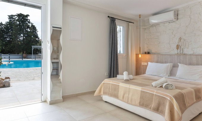 Panormos Apartment | Apartment 'No 16' with Shared Pool, Wi-Fi and Air Conditioning