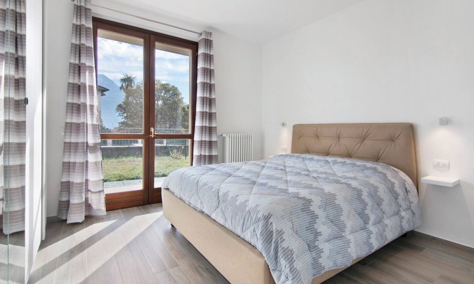 Consiglio di Rumo Apartment | Apartment "Orange Corner - Gravedona" with Mountain View, Terrace & Wi-Fi