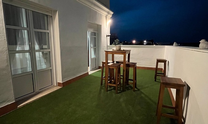 Pilas Apartment | Apartment 'Pilas' with Shared Pool, Wi-Fi and Air Conditioning