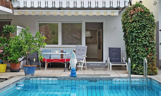 Suggental Apartment | Apartment 'Pool View' with Communal Pool, Private Terrace and Wi-Fi