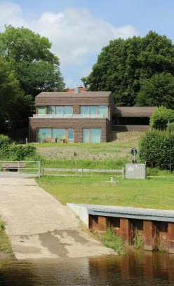 Suderstapel House | Architect House With Vintage Classics By River