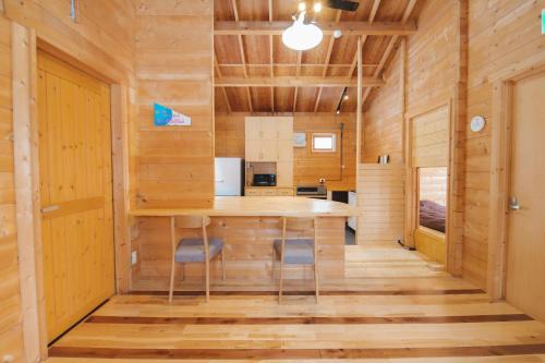 Ponto House | Artemina Kussharoko Log Terrace