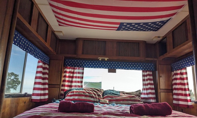 North Wheatley House | 'Arvey the American RV, parked on a picturesque campsite with its own garden